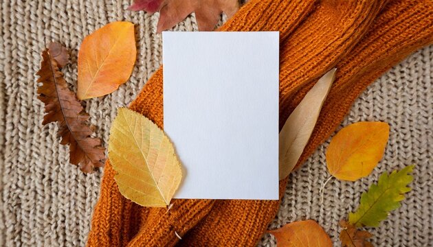 aesthetic autumn wedding invitation business brand design template flat lay blank paper card mock up fall leaves on neutral beige and bright ginger orange knitted textile background