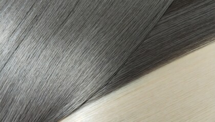 close up of texture of single piece clip in straight black to ash blonde ombre style synthetic hair extensions