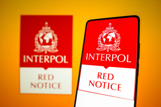 January 25, 2024, Brazil. In this photo illustration, the Interpol Red Notice logo is displayed on a smartphone screen.