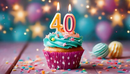 Birthday cupcake with burning lit candle with number 40. Number thirtynine for thirtynine years or thirtyninth anniversary.