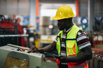 Portrait of industrial worker inspecting and check up machine at factory machines. Technician working in metal sheet at industry. Foreman checking Material or Machine.