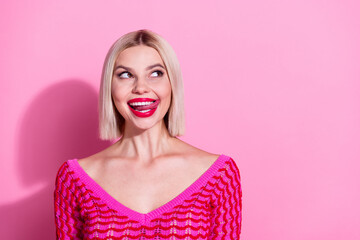 Photo of gorgeous cunning girl bite tongue lick red lips look empty space contemplate isolated on...