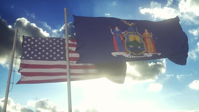 The New York state flags waving along with the national flag of the United States of America. In the background there is a clear sky