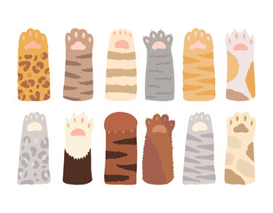 Vector cartoon set of various cute cat paws with soft pads and claws. Funny paws raised up. A flat illustration isolated on a white background.