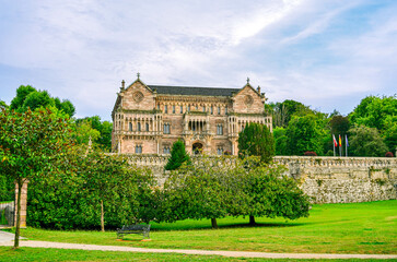 Fototapeta na wymiar Detail of the tower of the Gothic Neo-church, Palacio Sobrellano, Comillas, Cantabria, Spain 