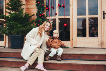 mother and son together on a walk in winter