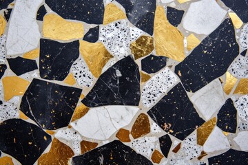 Close Up of Black and Gold Mosaic Tile in Intricate Pattern