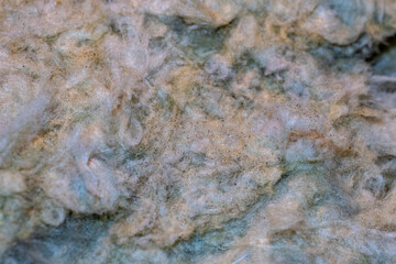 Close up of fibers of thermal insulation material, rock wool. Thermal roof insulation layer....