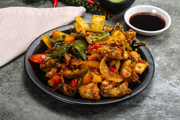 Vietnamese cuisine - fried frog with vegetables