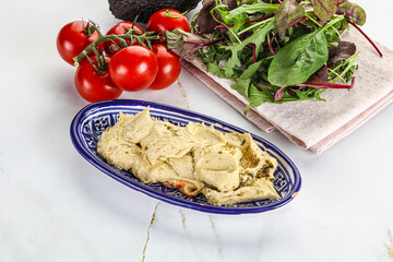 Creamy hummus in the bowl