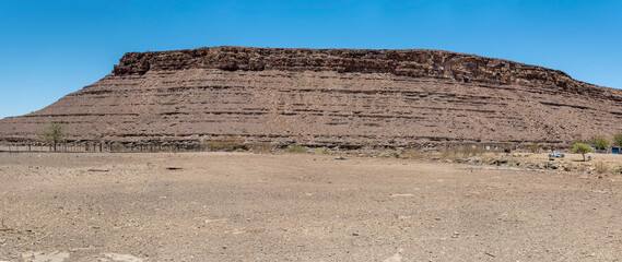 hill with layers of conglomerate and basalt in desert , near Fort Naiams,  Namibia