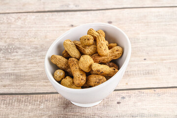 Raw ripe unpeeled peanut heap