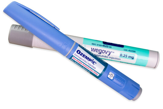 Ozempic And Wegovy brand semaglutide pens isolated 