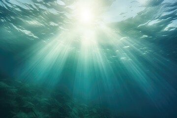 Fototapeta na wymiar The sun casts brilliant rays through the pristine ocean water, illuminating the underwater world with its radiant glow.