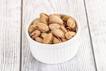 Salted tasty pistachio nuts heap