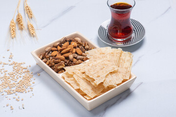 Tarhana chips, Turkish snack made with flour, wheat berries, mint, yogurt and spices also known as frik