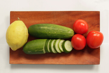 fresh fruits and vegetables for commercial and non-commercial use. Close up image of kitchen ingredients ready to be cooked. a combination of colors of fresh vegetables and fruit.