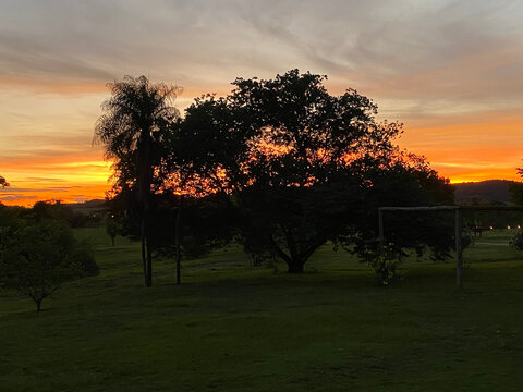 A beautiful sunset behind the trees in Bonito city - Mato Grosso do Sul - Brazil