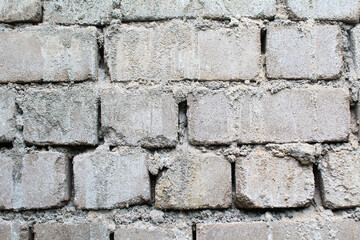 Cement bricks wall close-up view 