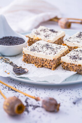 Homemade poppy seed cake with cream cheese icing
