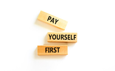 Pay yourself first symbol. Concept words Pay yourself first on beautiful wooden blocks. Beautiful white table white background. Business and pay yourself first concept. Copy space.