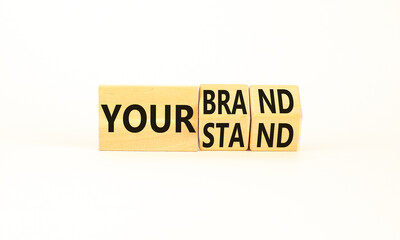 Branding your brand or stand symbol. Concept words Your stand Your brand on beautiful blocks. Beautiful white table white background. Business branding your brand or stand concept. Copy space.