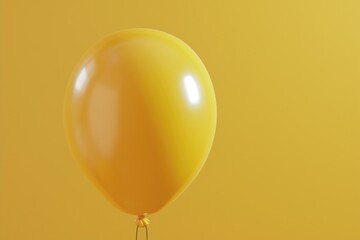 A yellow balloon floating in the air against a yellow background. Suitable for various occasions and celebrations