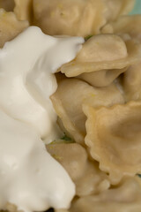small dumplings with wheat flour and pieces of meat