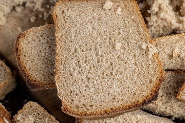 a loaf of dark rye sour bread in the kitchen