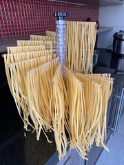 Homemade pasta on the rack to dry faster