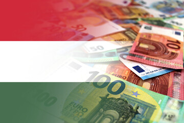 Obraz na płótnie Canvas Euro banknotes colored in the colors of the flag of Hungary. Gradient overlay of the Hungarian flag on the euro notes.