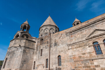 Fototapeta na wymiar Mother Cathedral in Etchmiadzin city, one of the oldest churches in the world. Early 4th century AD. Sunny day