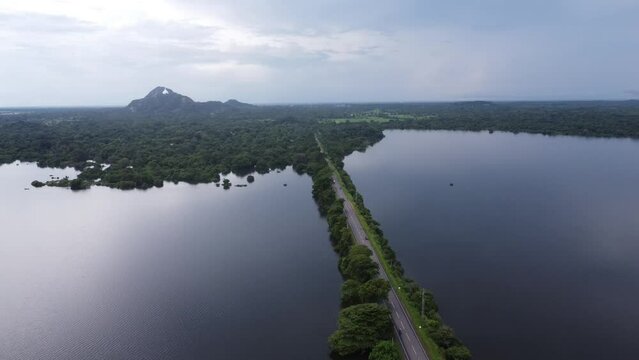 lake and mountains  
Aerial Symphony Enchanting Main Road Across the Lake
Above the Serenity:Drone Views of a Tranquil Mountain Lake
Sacred Heights: Dagaba Atop Elephant Mountain Oasis

