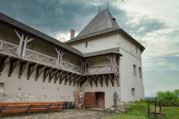 Medieval Halych Castle under stormy sky in Ukraine.
