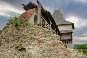 Medieval Halych Castle under stormy sky in Ukraine.