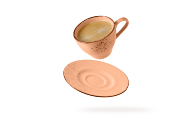 Pink coral cup hot coffee and saucer flying isolated on white background. Retro cup in trendy color of year 2022 Peach Fuzz