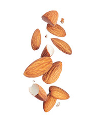 Levitation of whole and cracked almonds close-up in the air isolated on a white background