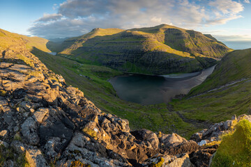 Beautiful summer scenery. Sunny summer view of fjord near Saksun , Faroe Islands. Splendid morning scene of Streymoy island, Denmark, Europe.
Landscape photography, Traveling concept background.