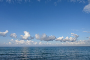 view of the Mediterranean sea and blue sky with clouds 10