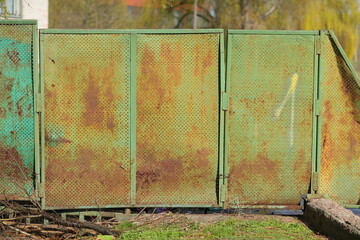 old metal fence in green colour