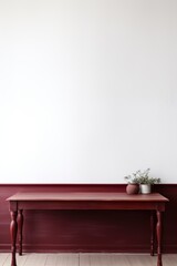 Empty wooden burgundy table over white wall background