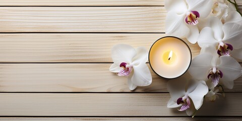 Spa still life concept,Close up of spa theme on wood background with burning candle and bamboo leaf...