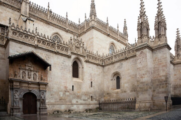 View of the old building - royal chapel-tomb of the Catholic Kings. La Capilla Real de Granada. Spain. - obrazy, fototapety, plakaty
