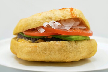Burger beef cheese minimal close up. Hamburger freshly baked on white plate, homemade. Grocery product advertising, menu or package.