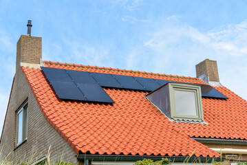 Solar panels on the roof of an energy efficient house