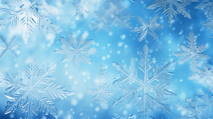 Fototapeta na wymiar Texture of blue snowflakes on glass, winter background