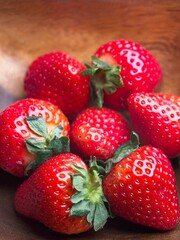 Close up of whole ripe strawberries.