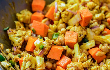 Healthy fresh meal, baked vegetables. Homemade delicious lunch with carrot, cauliflower for restaurant, menu, advert or package, close up selective focus