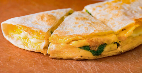 Healthy vegetarian breakfast, pita bread with omelette and vegetables. Vegan meal for restaurant, menu, advert or package, close up, selective focus