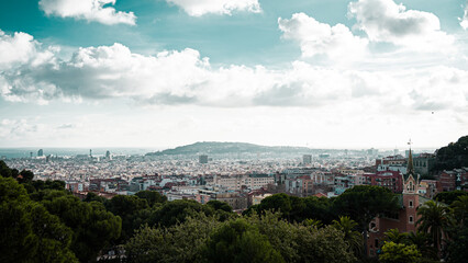 Obraz premium A Super wide Panoramic of Barcelona, Spain with a mountain in the distance